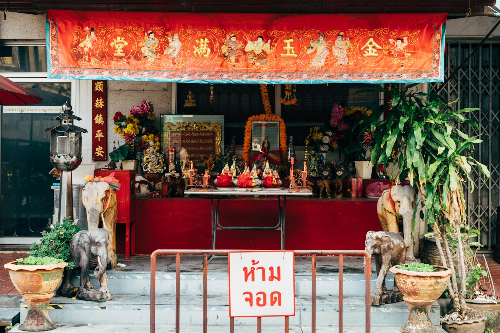 a restaurant with a few statues